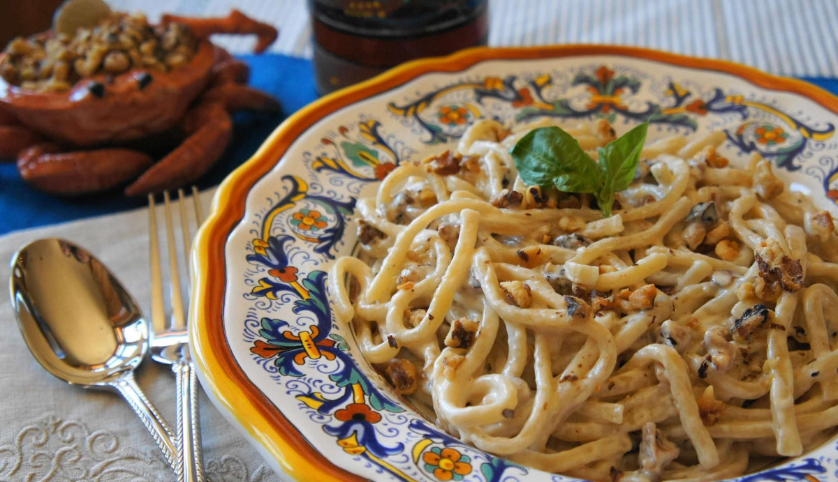 Noodles with Walnut Gorgonzola Sauce on Italian painted plate