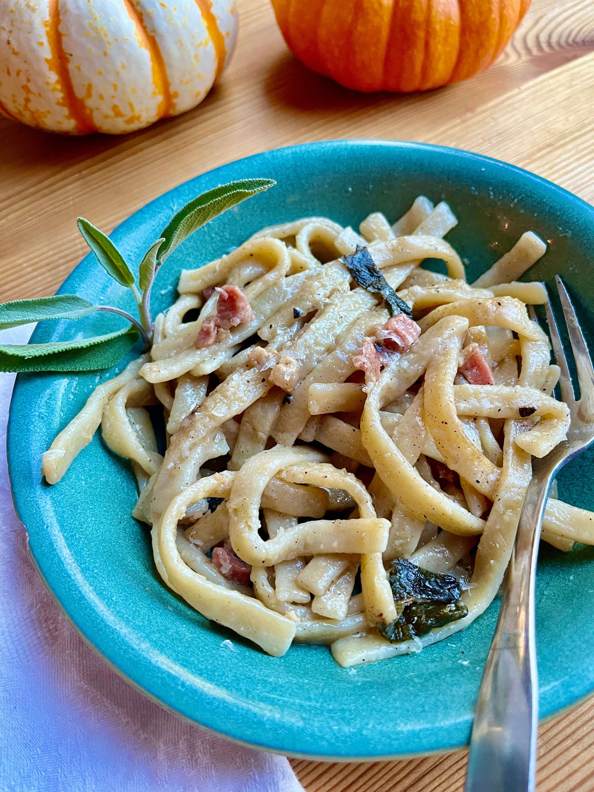 Egg noodles with Pancetta, Sage, and Parmesan ready to serve.