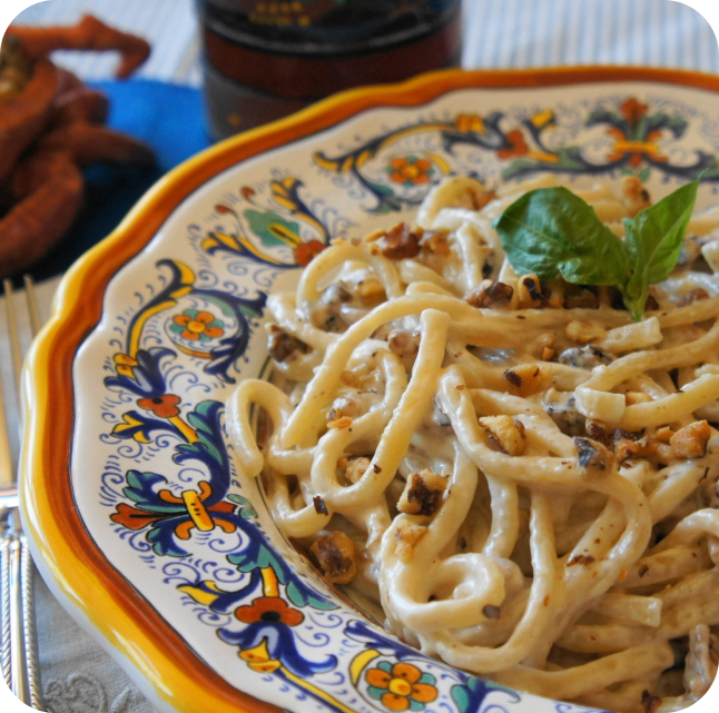 Italian painted plate with Grandma's noodles with Walnut Gorgonzola sauce.