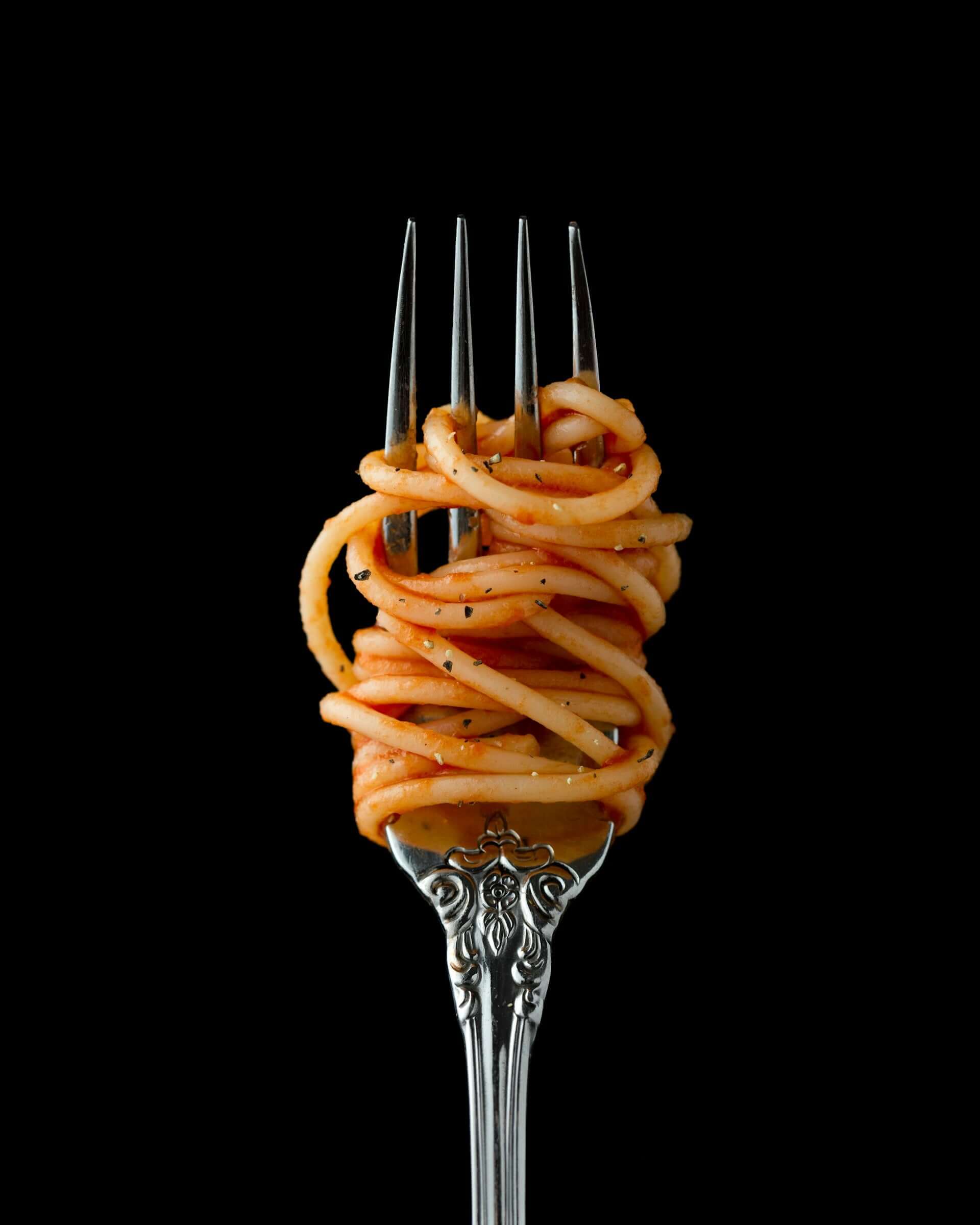 Grandma's spaghetti egg noodles on a fork.