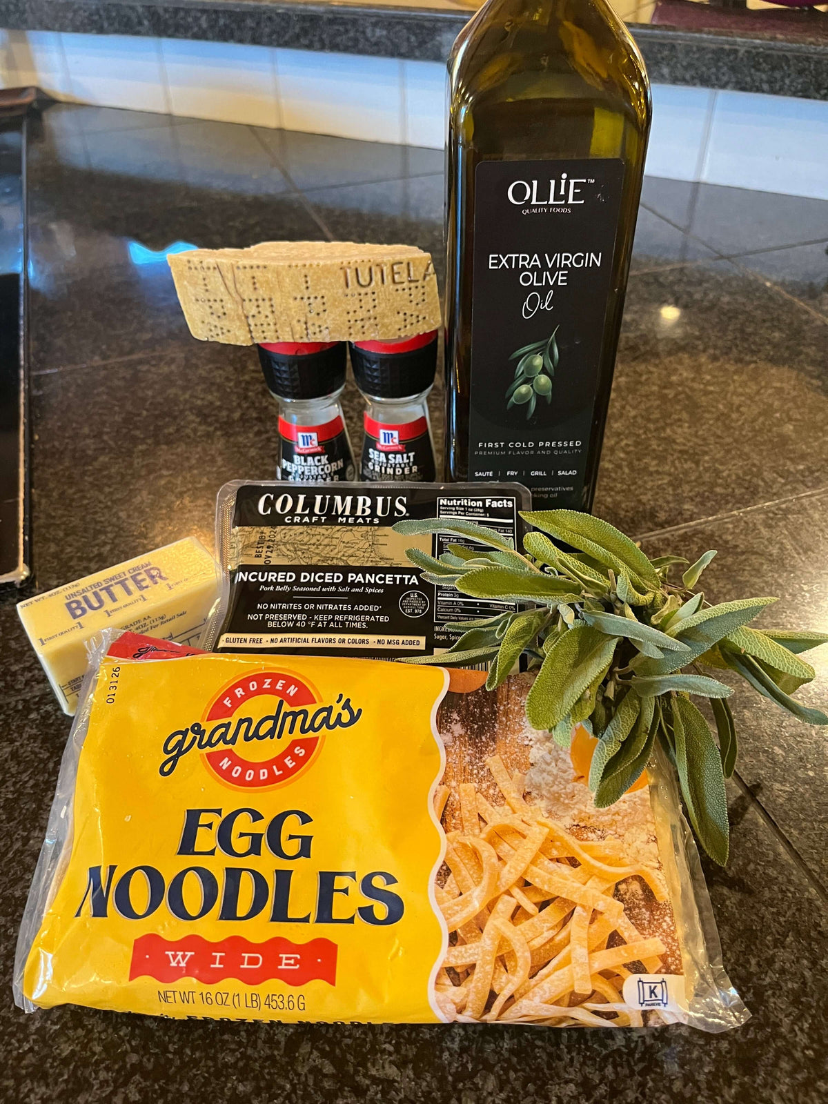 Recipe ingredients, including frozen egg noodles, olive oil, sage, pancetta and parmesan.